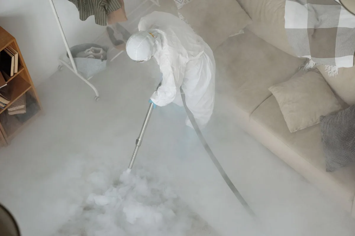 Biohazard cleanup technician in protective equipment, Lancaster, KY